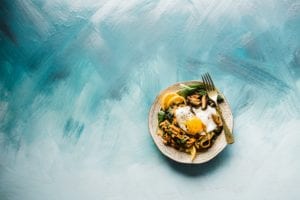 Small Plate Of Food On Blue Background